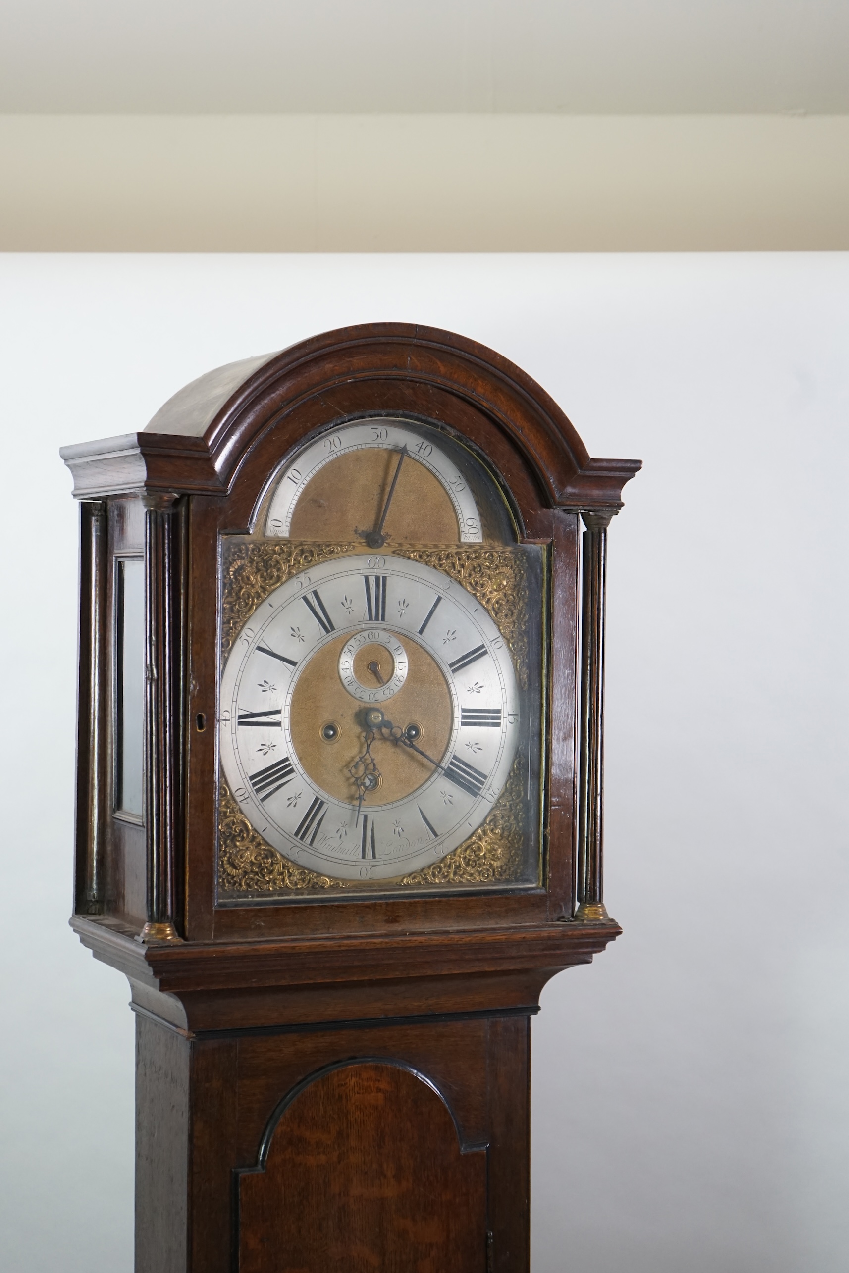 Windmills of London. A George III oak cased eight day longcase clock